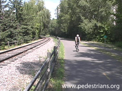 photo - bicyclist on rail trail.